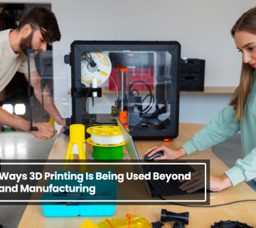 Two professionals working with a 3D printing machine and laptop, showcasing creative applications of 3D printing beyond traditional engineering and manufacturing