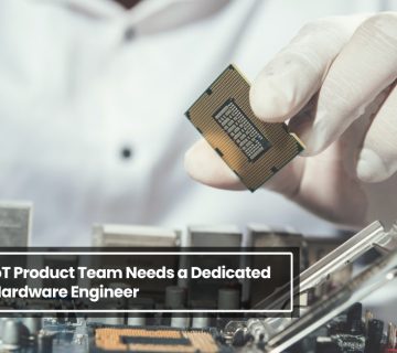 Embedded hardware engineer handling microchip and circuit board for IoT product design and development